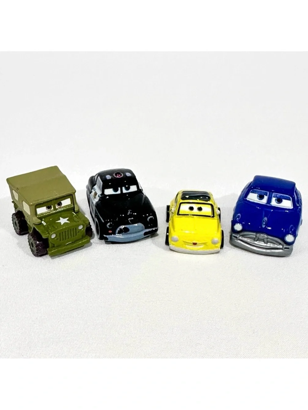 Disney Cars 3 Die-cast Mini Racers Doc Hudson, Sheriff, Luigi, Sarge Mattel 2016